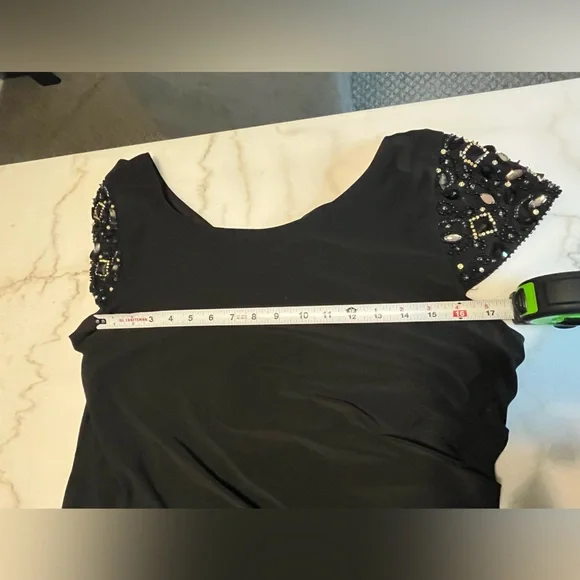 Elegant Black Dress with Embellished Sleeves - Picture 8 of 10